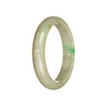 A half-moon shaped, genuine untreated grey jade bracelet with vibrant emerald green accents from Burma. The bracelet measures 51mm in width and is a stunning piece from the MAYS™ collection.