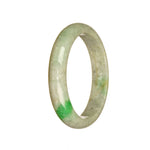 A close-up photo of a stunning jadeite jade bangle bracelet. The bracelet is made of Grade A grey jade with beautiful emerald green hues. It features a smooth half-moon shape and measures 51mm in diameter. A high-quality piece from MAYS GEMS.