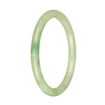 An exquisite light green jade bangle bracelet with a touch of apple green, crafted from genuine Grade A Burmese jade. This petite round 60mm bracelet is a stunning addition to any jewelry collection.