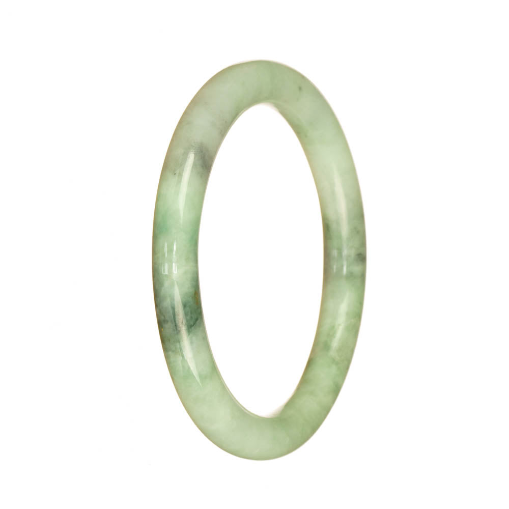 Close-up photo of a light green jadeite bangle bracelet with a delicate round shape, measuring 55mm in diameter. The bracelet has a beautiful pattern and is made of high-quality Grade A jadeite.