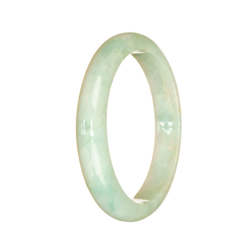 A light green traditional jade bracelet with a half moon design, made of authentic Grade A jade.