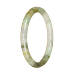 A small round pale green jadeite bracelet with natural patterns, perfect for adding a touch of elegance to any outfit.