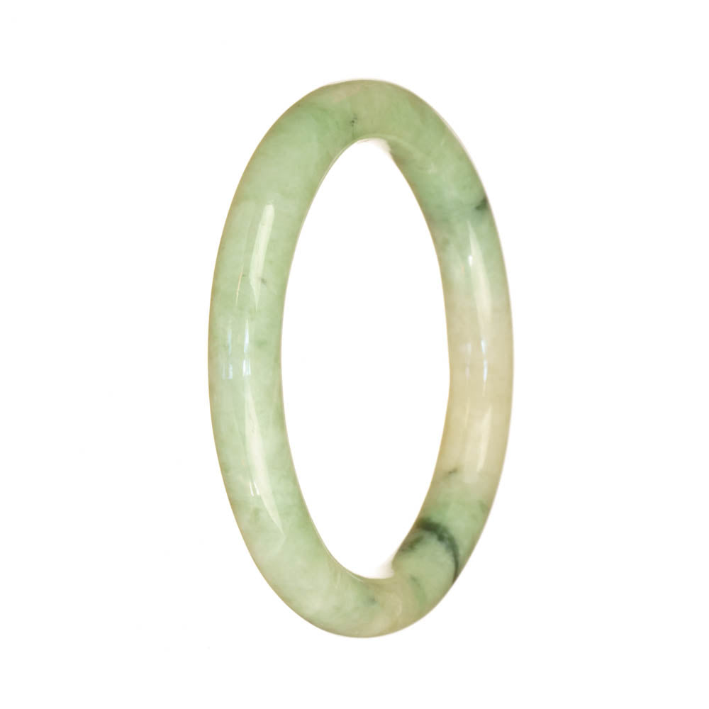 A delicate and authentic light green Burmese jade bracelet, featuring a petite round design measuring 55mm in size. Created by MAYS.