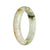 A beautiful jade bracelet with a white and green pattern, featuring a 56mm half moon design.