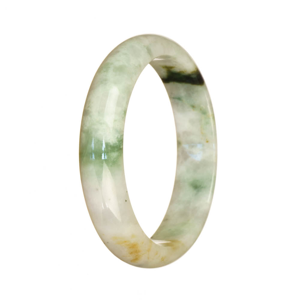 A beautiful half moon jade bracelet with a white and green pattern.