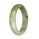A close-up photo of a beautiful green and white patterned bangle bracelet made from genuine Type A Burma Jade. The bracelet is in a half-moon shape and measures 57mm in diameter. Created by MAYS™.