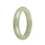A light green jadeite jade bracelet in a half moon shape, measuring 55mm, sourced from genuine Grade A jade.