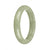 An exquisite green Burmese jade bangle with a half moon shape, measuring 59mm. A high-quality piece from MAYS™.