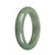 A high-quality, authentic green Burmese jade bangle with a 58mm half moon shape, available at MAYS GEMS.