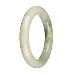 A close-up photo of a round jade bangle bracelet with a white base color and a green pattern. The bracelet has a smooth and polished surface, with a diameter of 57mm. It is a genuine Type A jade, known for its quality and authenticity. The bangle is sold by MAYS GEMS.