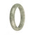 A half moon shaped jade bangle bracelet, made from authentic untreated grey pattern Burmese jade.