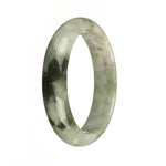 An elegant and unique natural grey jadeite jade bangle with dark green patterns and brown patches, featuring a half moon shape.