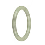 A close-up of a petite round jade bangle bracelet made from genuine Grade A Green Burma Jade.