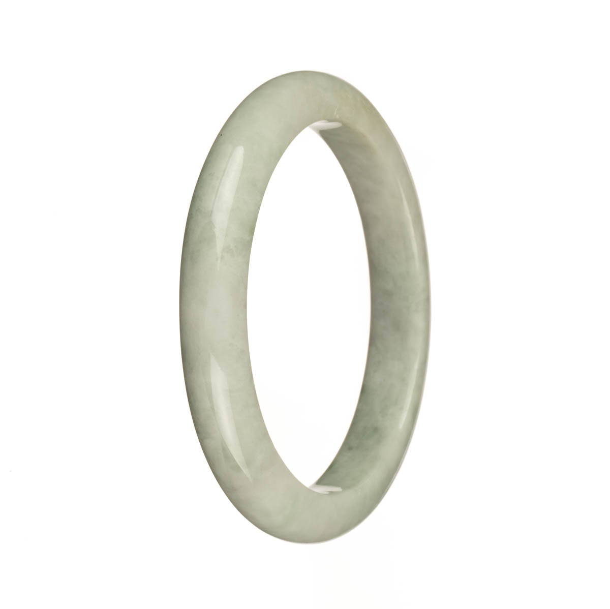 A pale green Burmese jade bangle bracelet with a green pattern.