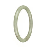 A small, round light green jade bangle with a genuine Type A certification. Perfect for those with petite wrists, this MAYS™ bangle measures 60mm in diameter.