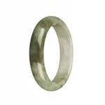 A stunning Burmese Jade bangle bracelet featuring a Real Grade A White and Light Green with Olive Green Patterns. The bracelet is shaped like a 54mm Half Moon and is a beautiful addition to any jewelry collection. From MAYS™.