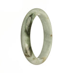 A close-up image of a traditional jade bracelet made from genuine Grade A grey jade. The bracelet has a unique dark green pattern and is shaped like a half moon. It measures 59mm in size. This high-quality piece of jewelry is available from MAYS GEMS.