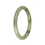 A petite round Burmese jade bracelet with a beautiful mix of pale green, apple green, and brown patches.