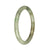 A round jade bangle bracelet with a beautiful combination of grey, apple green, and brown patterns, certified as Grade A. The petite size measures 59mm in diameter. Created by MAYS.