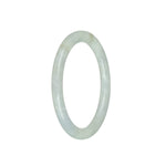 Close-up photo of an authentic Grade A White Burmese Jade Bangle. The bangle is petite and round, measuring 59mm in diameter. The jade is smooth and lustrous, displaying a stunning white color. This elegant piece of jewelry is from the MAYS™ collection.