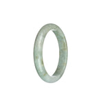 A beautiful light grey Burma Jade bracelet with pale green and brown spots, certified Grade A. The bracelet features a 54mm half moon design.