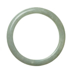 A light green Burmese jade bracelet with a semi-round shape, featuring genuine untreated stones.