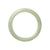 A green Burma jade bangle with a semi-round shape, measuring 56mm in diameter.