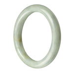 Close-up image of a beautiful pale green jade bangle with a semi-round shape, showcasing its authentic natural texture and color. Perfect accessory to add a touch of elegance to any outfit.