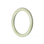 A close-up image of a petite round green jadeite bracelet. The bracelet is made of authentic natural green jadeite, known for its vibrant green color. The jadeite beads are strung together to form the bracelet, creating a stylish and elegant piece of jewelry. The bracelet has a diameter of 53mm, making it a perfect fit for petite wrists. This exquisite bracelet is a stunning addition to any jewelry collection and is offered by MAYS GEMS.