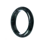 A close-up image of a half moon-shaped dark grey jadeite jade bangle, showcasing its natural texture and color.