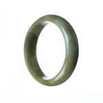 A close-up image of a grey-brown jade bangle bracelet, shaped like a half moon, with a smooth and polished surface. The bracelet is made of genuine Grade A jadeite jade and has a circumference of 59mm. It is a beautiful piece of jewelry from MAYS™.