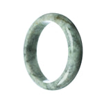 A close-up photo of a beautiful grey jade bracelet in the shape of a half moon, with a smooth and polished surface. The bracelet is made of high-quality Grade A grey jade and measures 59mm in diameter. The light reflects off the bracelet, showcasing its elegant and luxurious appearance. Perfect for adding a touch of sophistication to any outfit.