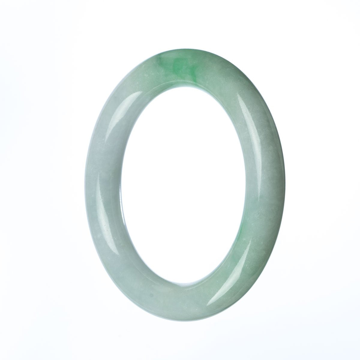 A close-up image of a round, certified natural green white jadeite bracelet. The bracelet is 58mm in diameter and is sold by MAYS GEMS.