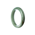 A small, half-moon shaped green jadeite bangle bracelet for children.