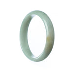 A pale green jade bangle bracelet with a half-moon design, measuring 54mm in size.
